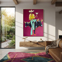 Two Horns Hold Balance - cowboy between bulls painting by Ethan Mercer, contemporary Western vertical wall art – styled room scene view 1