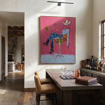 Blue Legs Fill Glass - cowboy in cocktail glass painting by Ethan Mercer, contemporary Western vertical wall art – styled room scene view 3