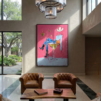 Blue Legs Fill Glass - cowboy in cocktail glass painting by Ethan Mercer, contemporary Western vertical wall art – styled room scene view 6