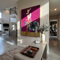 Pale Rider Crowns Teal - cowgirl riding teal bull painting by Ethan Mercer, contemporary Western vertical wall art – styled room scene view 4