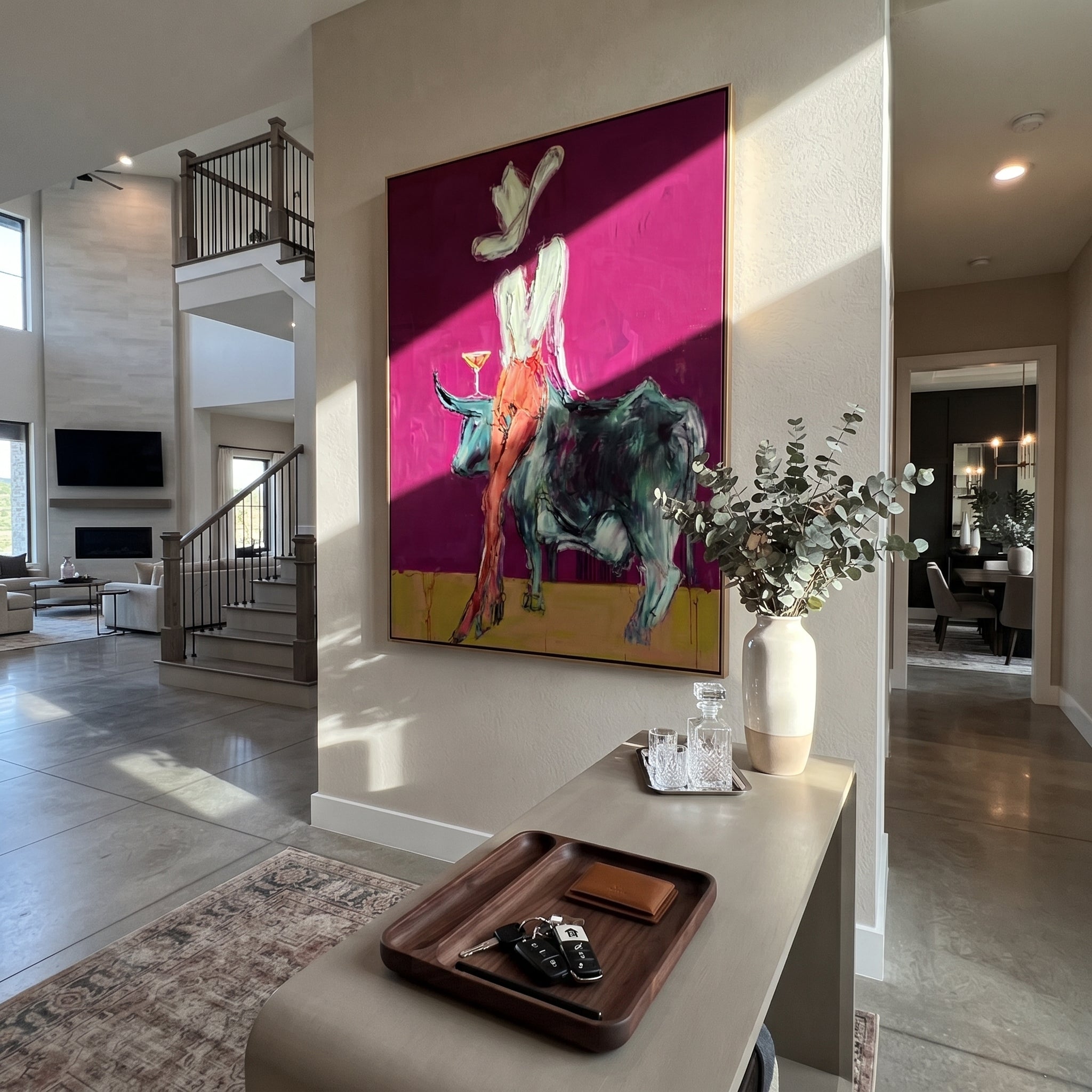 Pale Rider Crowns Teal - cowgirl riding teal bull painting by Ethan Mercer, contemporary Western vertical wall art – styled room scene view 4