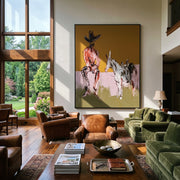Two Horses Wait Nearby - seated cowboy horses painting by Ethan Mercer, contemporary Western vertical wall art – styled room scene view 1