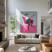 Red Chair Floats Blue - cowboy cocktail chair painting by Ethan Mercer, contemporary Western vertical wall art – styled room scene view 1
