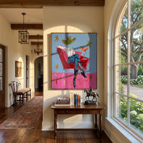 Red Chair Floats Blue - cowboy cocktail chair painting by Ethan Mercer, contemporary Western vertical wall art – styled room scene view 3