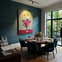 Magenta Glass Holds White - cowgirl in cocktail glass painting by Ethan Mercer, contemporary Western vertical wall art – styled room scene view 2