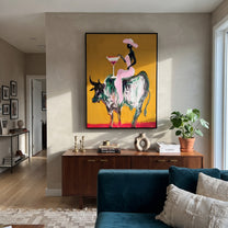 Golden Ground Raises Toast - black rider bull painting by Ethan Mercer, contemporary Western vertical wall art – styled room scene view 4
