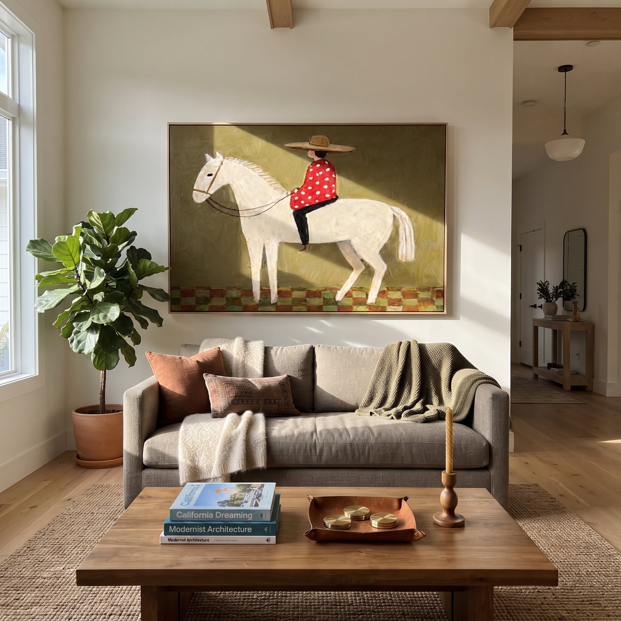 Red Dots Ride Ivory - folk rider horse painting by Ethan Mercer, contemporary Western horizontal wall art – styled room scene view 1