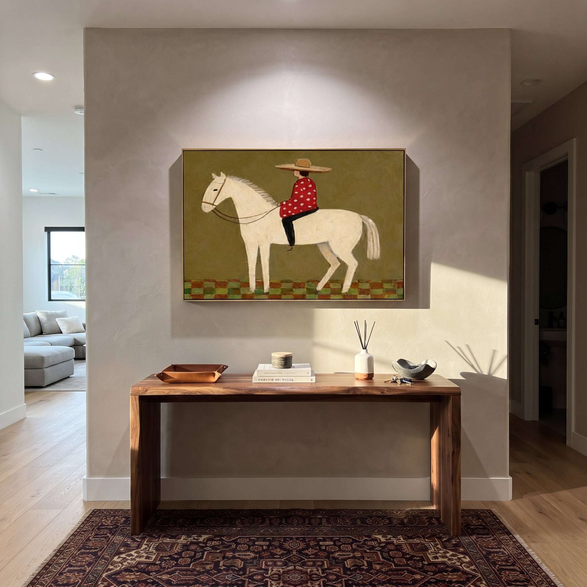 Red Dots Ride Ivory - folk rider horse painting by Ethan Mercer, contemporary Western horizontal wall art – styled room scene view 2