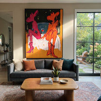Two Cowgirls Trade Stories - neon cowgirl pair painting by Ethan Mercer, contemporary Western vertical wall art – styled room scene view 2