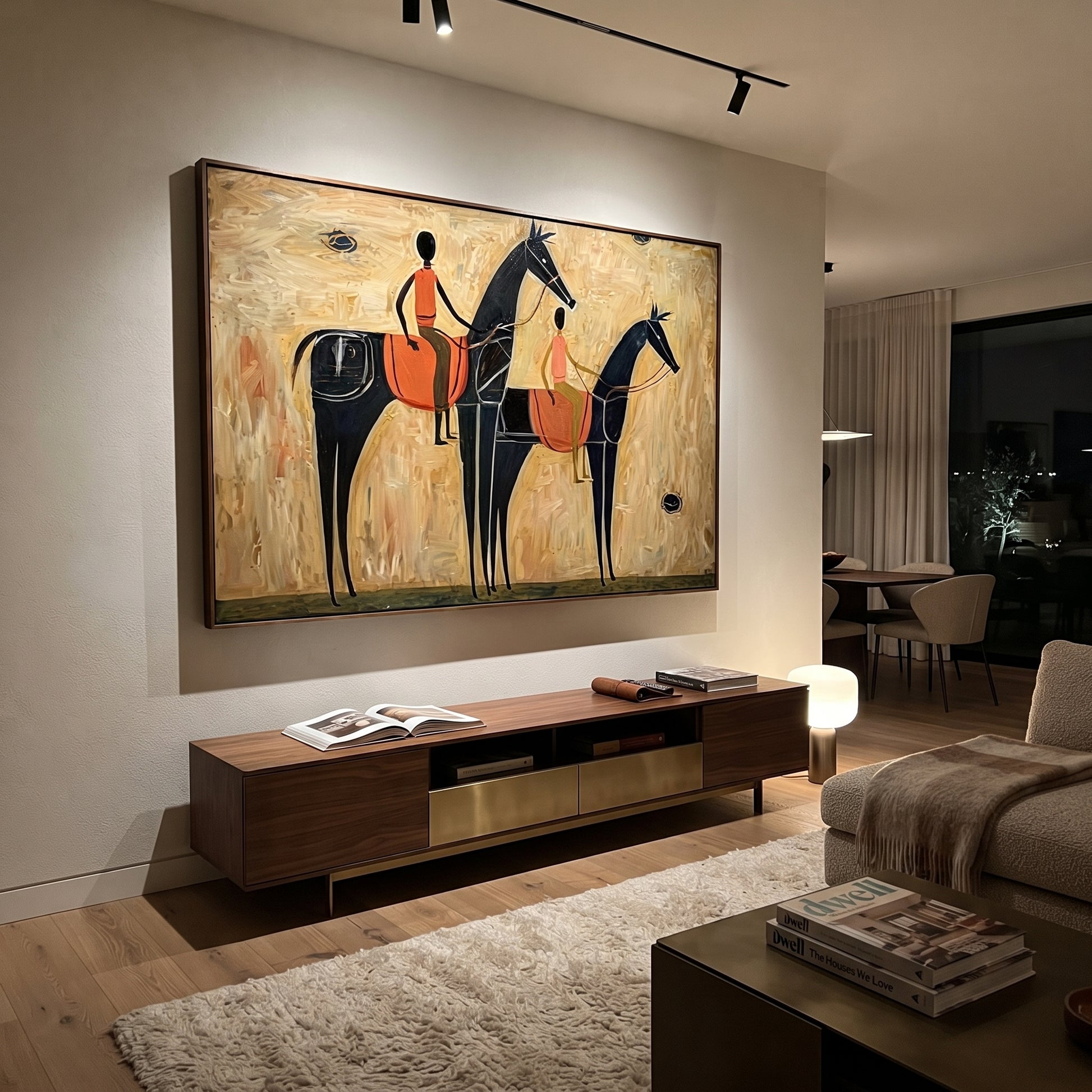 Two Riders Cross Ochre - two black horse riders by Ethan Mercer, contemporary Western horizontal wall art – styled room scene view 5