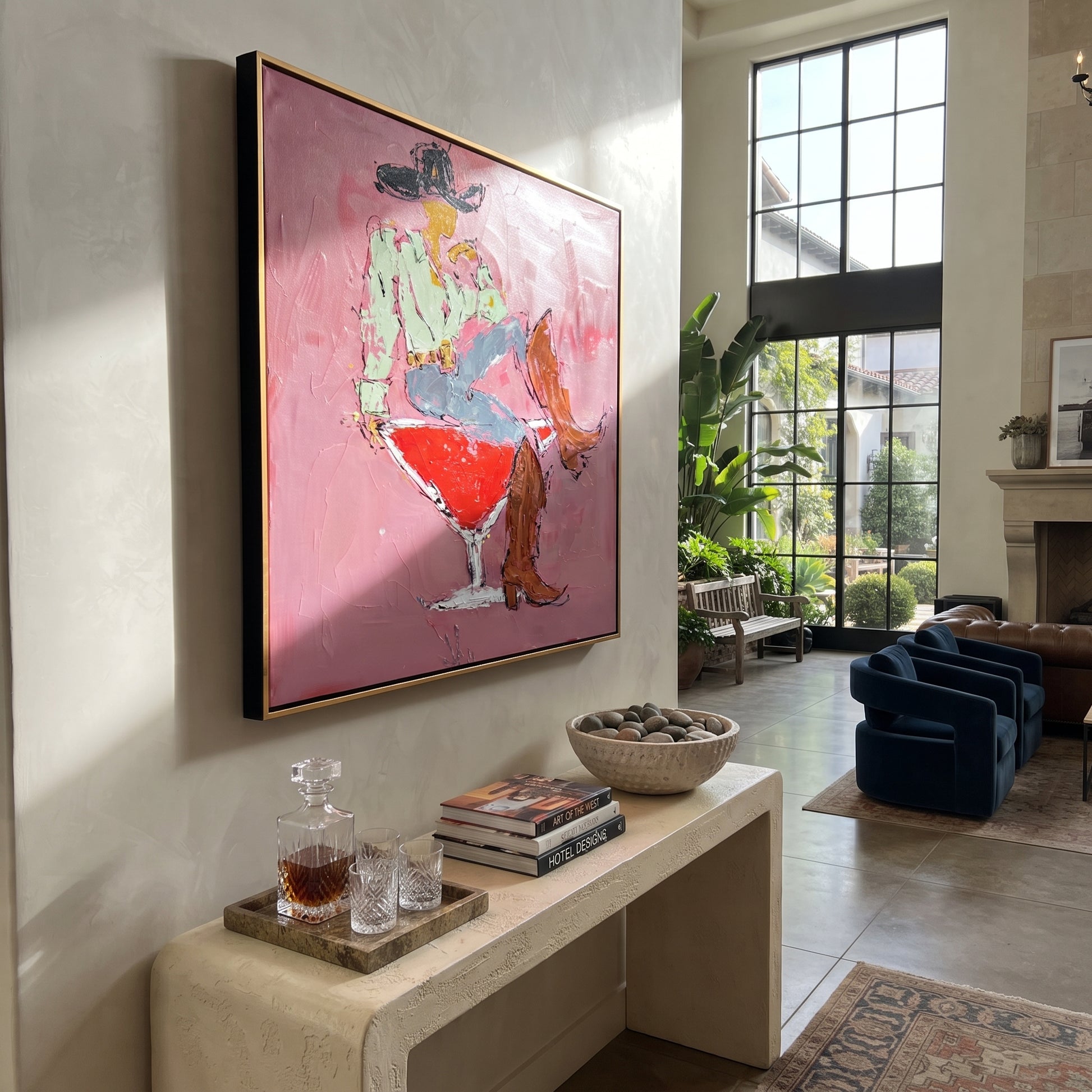 Red Glass Carries Denim - cowboy cocktail glass painting by Ethan Mercer, contemporary Western square wall art – styled room scene view 2