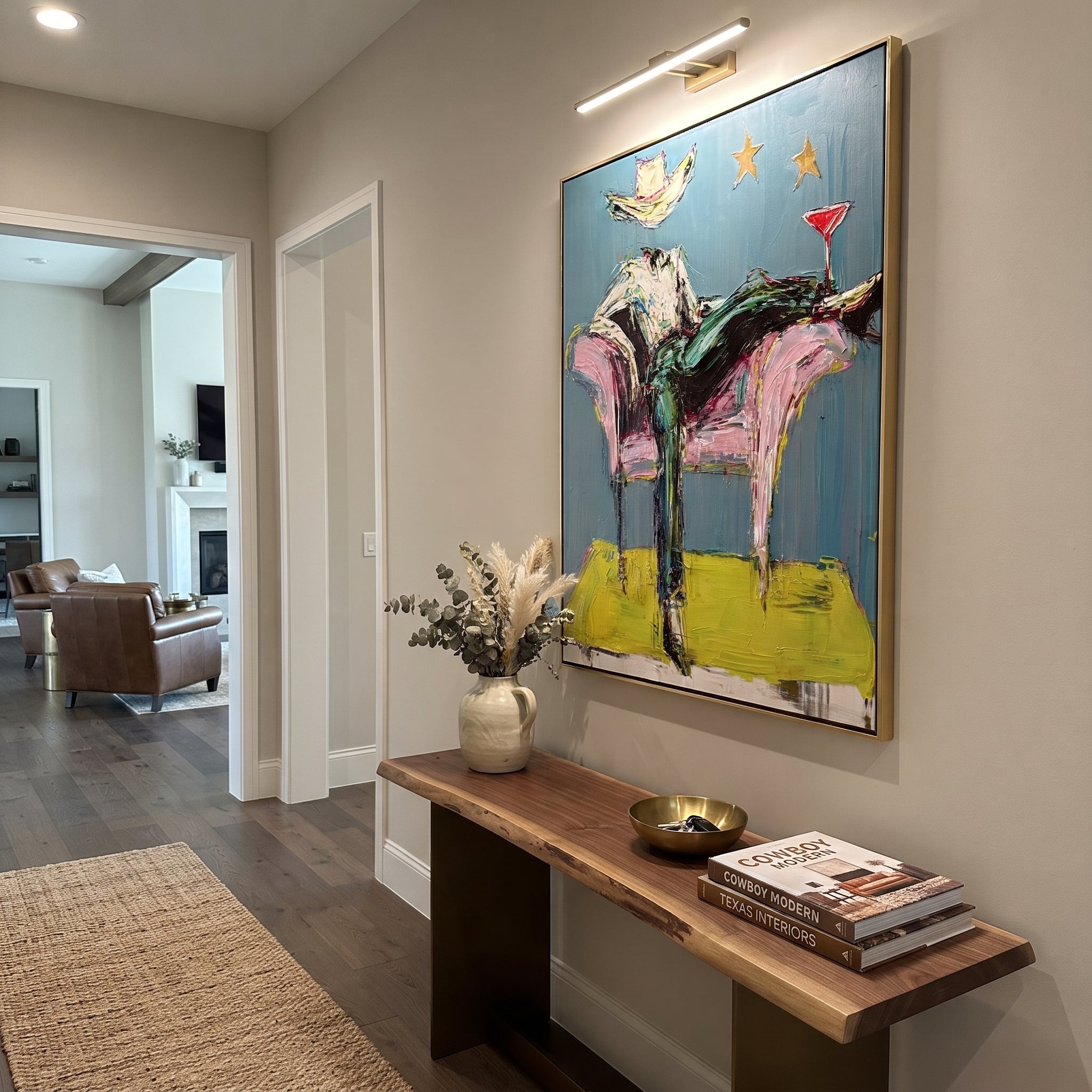 Blue Chair Catches Breath - reclining cowboy chair painting by Ethan Mercer, contemporary Western vertical wall art – styled room scene view 2