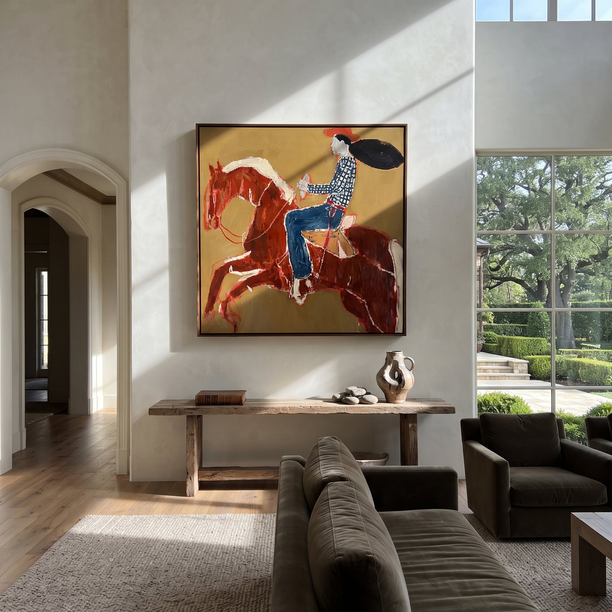 Twin Red Horses Leap - rider two horse painting by Ethan Mercer, contemporary Western square wall art – styled room scene view 3