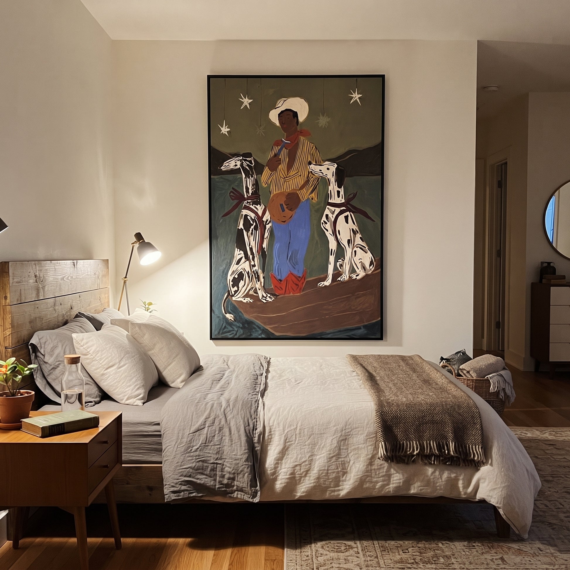 Two Hounds Guard Starlight - cowboy with two dogs painting by Ethan Mercer, contemporary Western vertical wall art – styled room scene view 4