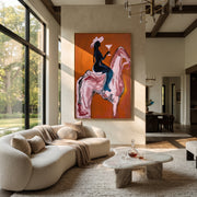 Pink Horse Carries Toast - cowgirl cocktail horse painting by Ethan Mercer, contemporary Western vertical wall art – styled room scene view 1