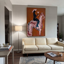 Pink Horse Carries Toast - cowgirl cocktail horse painting by Ethan Mercer, contemporary Western vertical wall art – styled room scene view 3