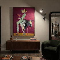 Purple Horns Bear Mint - cowgirl purple bull painting by Ethan Mercer, contemporary Western vertical wall art – styled room scene view 5