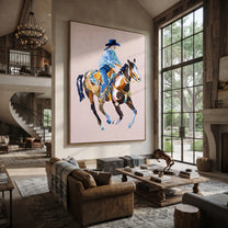Blue Rider Floats Pale - cowboy pink horse painting by Ethan Mercer, contemporary Western vertical wall art – styled room scene view 2
