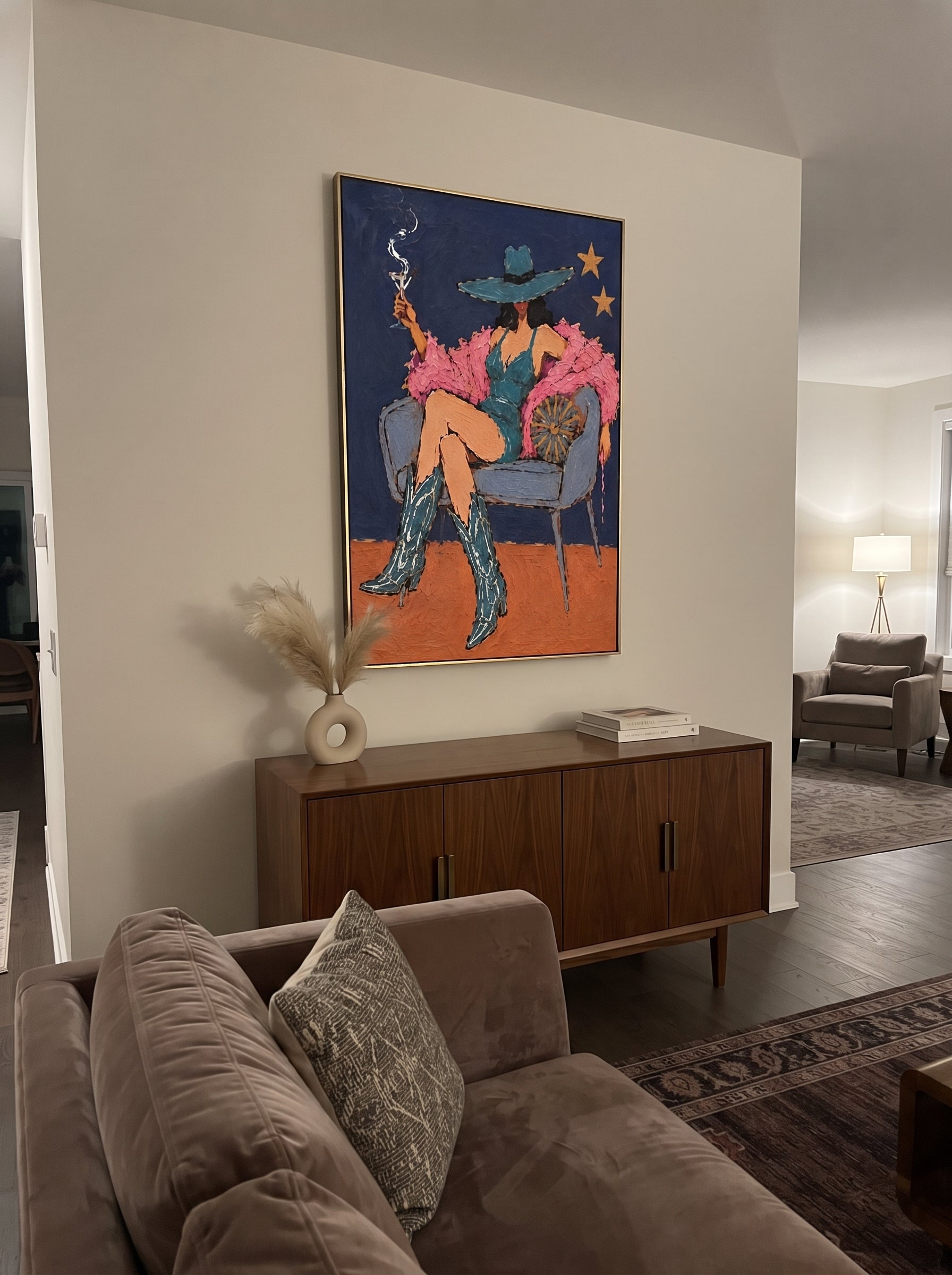 Smoke Curls Above Feathers - smoking cowgirl chair painting by Ethan Mercer, contemporary Western vertical wall art – styled room scene view 6