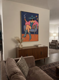 Smoke Curls Above Feathers - smoking cowgirl chair painting by Ethan Mercer, contemporary Western vertical wall art – styled room scene view 6