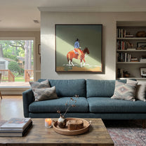 Chestnut Steps Cross Olive - rider landscape horse painting by Ethan Mercer, contemporary Western square wall art – styled room scene view 3