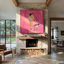 Pink Road Walks Together - cowgirl walking dog painting by Ethan Mercer, contemporary Western square wall art – styled room scene view 2