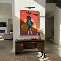 Orange Chair Keeps Night - dark cowboy chair painting by Ethan Mercer, contemporary Western vertical wall art – styled room scene view 5