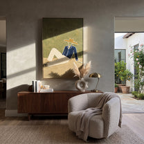 Cream Trousers Cross Earth - minimal reclining cowboy painting by Ethan Mercer, contemporary Western vertical wall art – styled room scene view 4