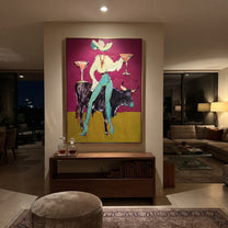 Twin Martinis Ride Midnight - cowgirl bull cocktails painting by Ethan Mercer, contemporary Western vertical wall art – styled room scene view 5
