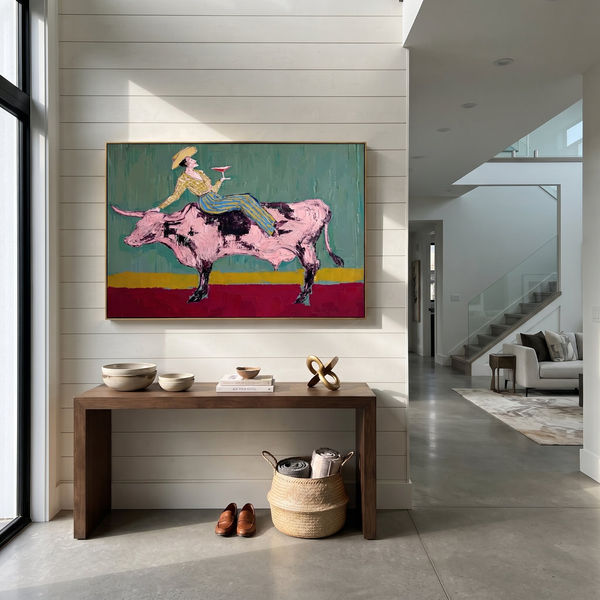 Pink Bull Crosses Teal - cowgirl bull wine painting by Ethan Mercer, contemporary Western horizontal wall art – styled room scene view 6