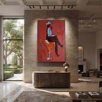 Crimson Glass Carries Rider - cowboy riding cocktail painting by Ethan Mercer, contemporary Western vertical wall art – styled room scene view 3