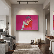 Pink Room Holds Repose - reclining cowboy chair painting by Ethan Mercer, contemporary Western horizontal wall art – styled room scene view 5