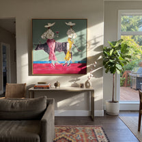 Bull Waits Between Toasts - bull cocktail cowgirl painting by Ethan Mercer, contemporary Western square wall art – styled room scene view 1