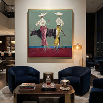 Bull Waits Between Toasts - bull cocktail cowgirl painting by Ethan Mercer, contemporary Western square wall art – styled room scene view 5
