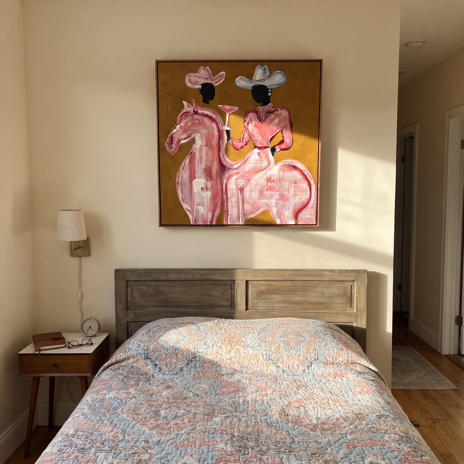 Pink Rider Raises Glass - pink horse cowgirl painting by Ethan Mercer, contemporary Western square wall art – styled room scene view 2