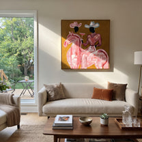 Pink Rider Raises Glass - pink horse cowgirl painting by Ethan Mercer, contemporary Western square wall art – styled room scene view 5