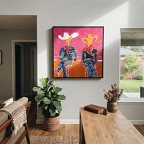 Neon Cowboys Share Silence - neon seated cowboys painting by Ethan Mercer, contemporary Western square wall art – styled room scene view 1