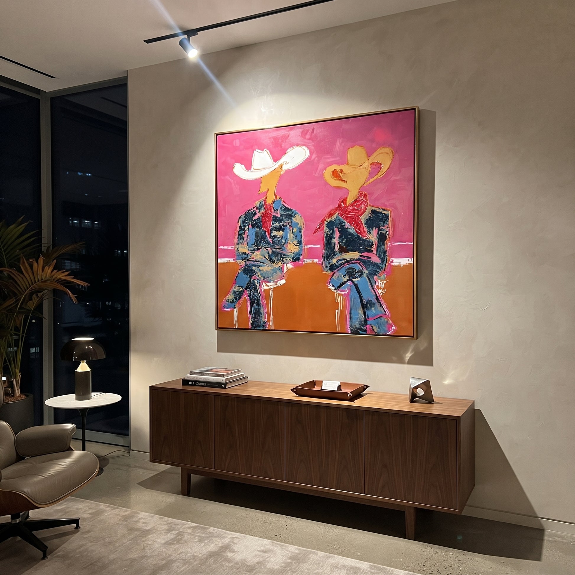 Neon Cowboys Share Silence - neon seated cowboys painting by Ethan Mercer, contemporary Western square wall art – styled room scene view 5