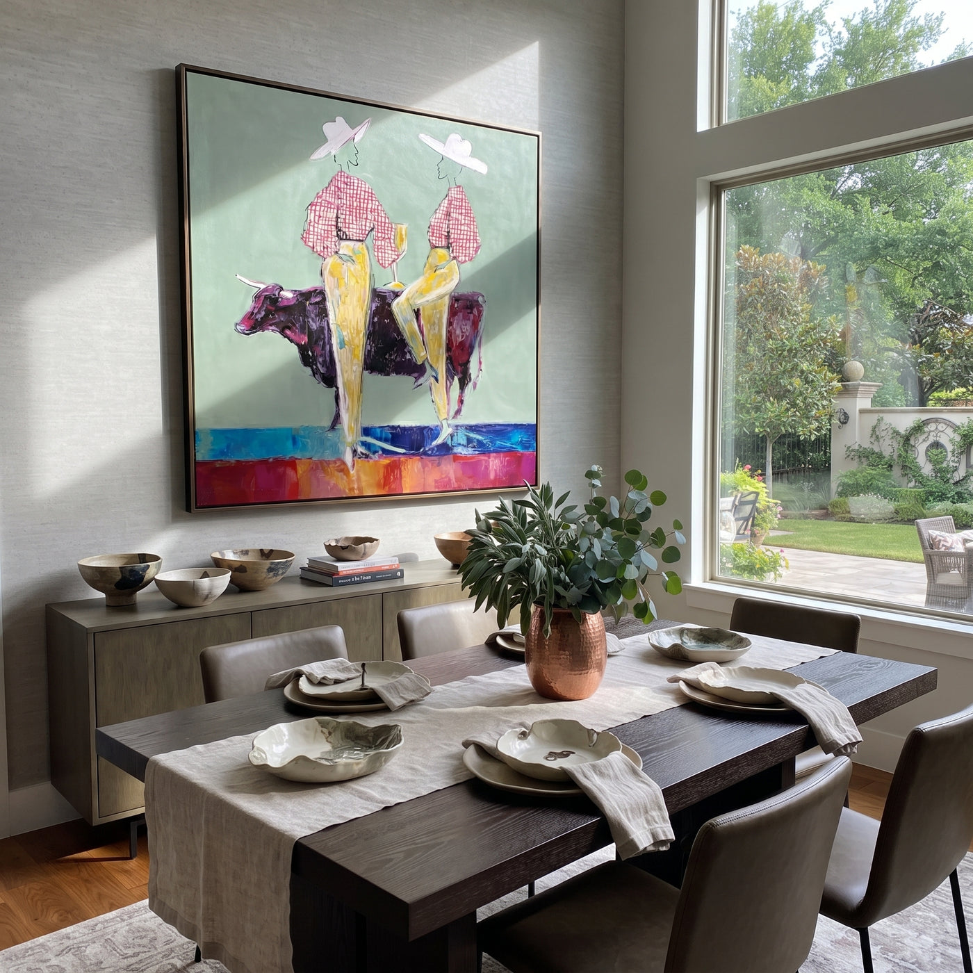 Gold Trousers Frame Bull - bull cowgirl pair painting by Ethan Mercer, contemporary Western square wall art – styled room scene view 3