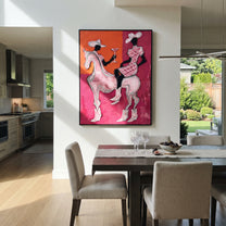 Pink Riders Exchange Toast - pink horse cowgirls painting by Ethan Mercer, contemporary Western vertical wall art – styled room scene view 4